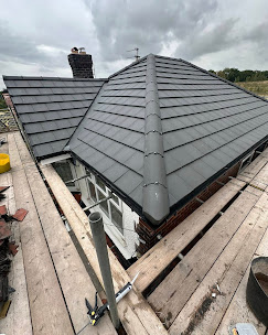 Newly tiled hipped roof in Greater Manchester